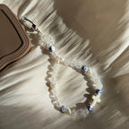 Atelier Selena - Bijou de téléphone avec croix en céramique