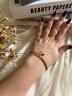 Atelier Séléna - Bracelet croix et pierre de naissance Mai - Plaqué or 18k - avec écrin