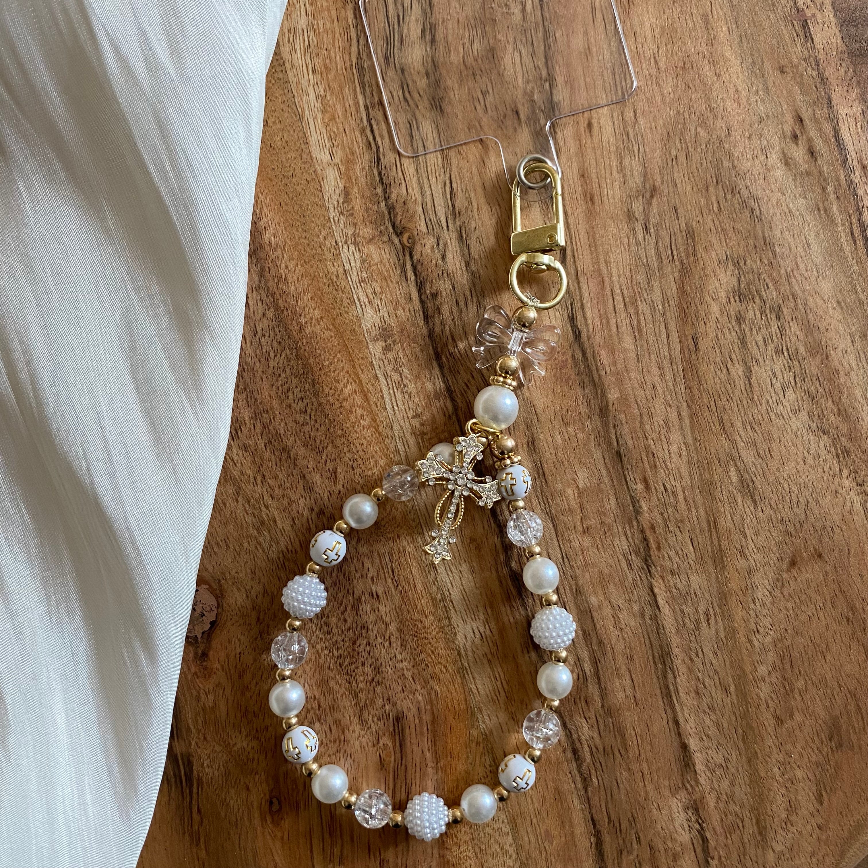 Bijou de téléphone - Élégance Perles et Croix Dorée