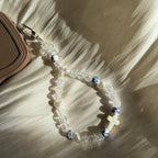 Atelier Selena - Bijou de téléphone avec croix en céramique